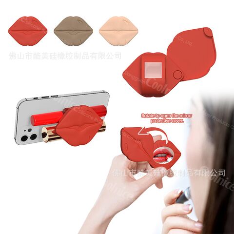 Kumei silicone lipstick holder with mirror, sticks to the back of a phone, doubles as a phone stand