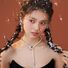 Колье Kaitin Jewelry из бусин искусственного жемчуга с подвеской-птичкой и цирконами