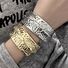 Широкий браслет-бэнгл KAYMEN JEWELRY BR-03615, цинковый сплав, асимметричный рельефный дизайн, 60 г