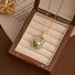 Серьги-подвески kaitin jewelry с искусственным жемчугом и эмалью, иглы из серебра 925, золотисто-зелёные