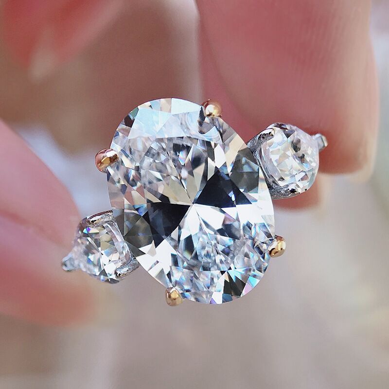 Кольцо MUJING Jewelry из серебра 925 с крупным овальным камнем 10×14 мм high carbon, четыре крапана